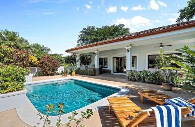 Stylish Home with Chic Decor, Luxury Amenities & Tropical Outdoor Oasis with Spa