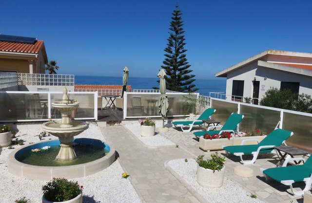 stylish living over 2 floors, with a sweeping view of the Atlantic