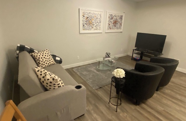 Suite close to the airport in Calgary with dedicated concrete pad for parking