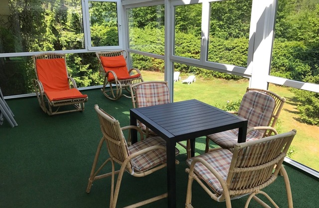 Suite for up to four people with conservatory and balcony
