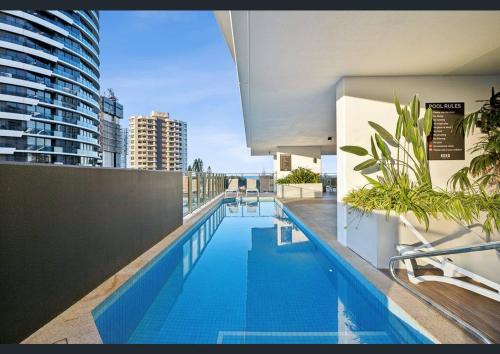 Sun-Kissed Coastal Comfort Pool,Gym,Beach,BBQ