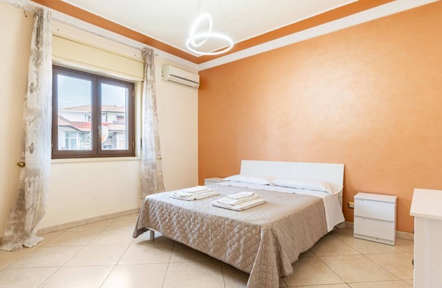 Sun-Kissed Terrace Oasis in Aci Catena