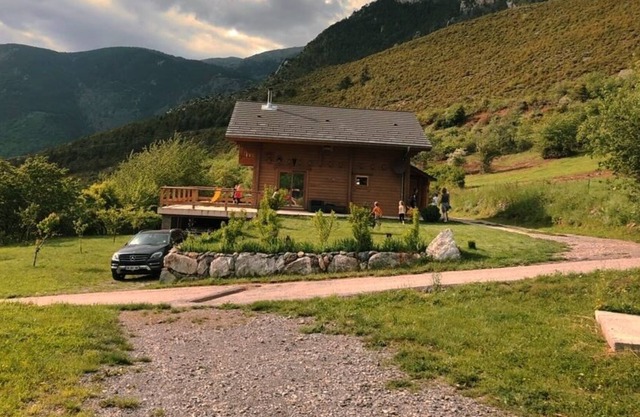 Sunny modern wooden chalet with garden