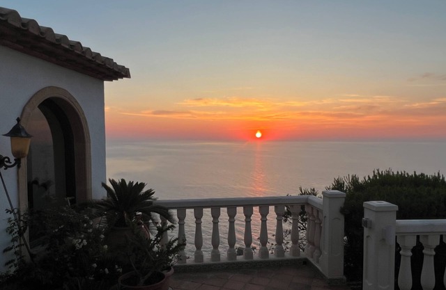 Sunrise on the cliff of Javea
