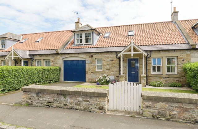 Superb cottage situated on a quiet road with a walled garden to the rear.