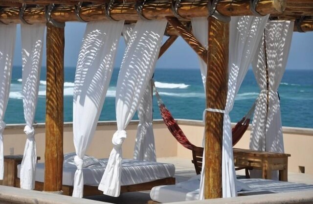 Surf house with pool on private point break