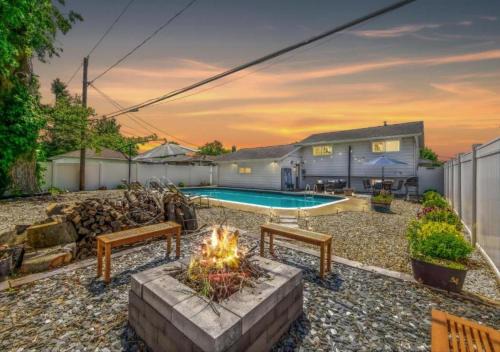 Swim and Relax with a Pool Hot Tub and Renovated HomeHop