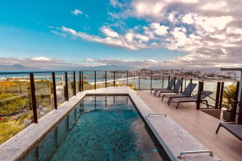 The Bridge by Xtay -Estúdios em Floripa com Piscina no Rooftop e Academia Completa, Próximos das Praias Populares