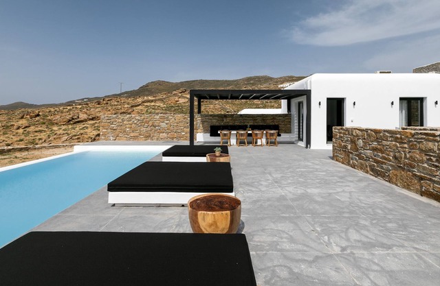 The Greek Touch is Fused With the Luxurious Design and the Colorful Sunset View