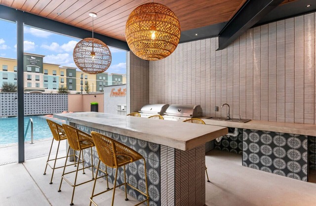 The Mercer *Freiheit Village Luxury Condo Complex