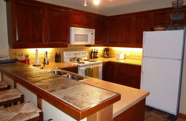 The snow is flying! Powderhorn 215 is a larger 1 BR/den w/slope views