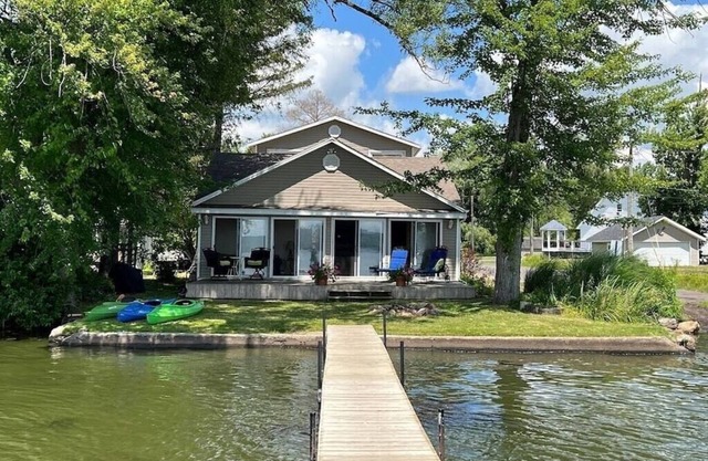 This charming lake cottage located in a peaceful, safe community right on the lake!