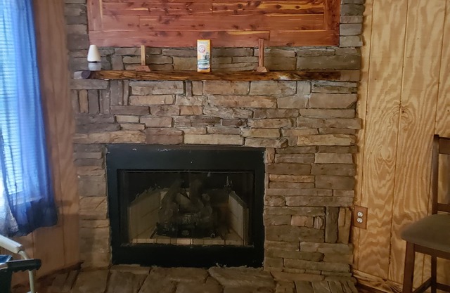This secluded cabin is tucked away in the mountains. With a handicap access ramp