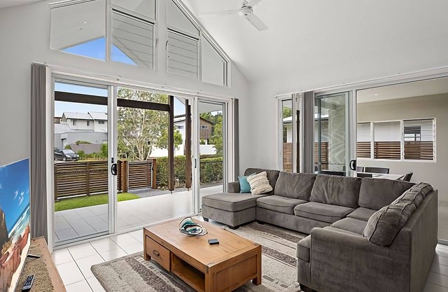 This stunning home with modern amenities is just a short walk to the beach