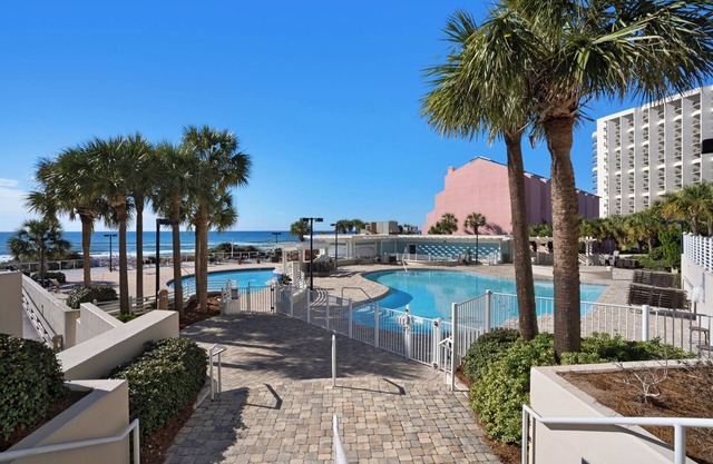 Tides 107 - beautiful beachfront condo ~ 2 pools ~ beach ~ private resort