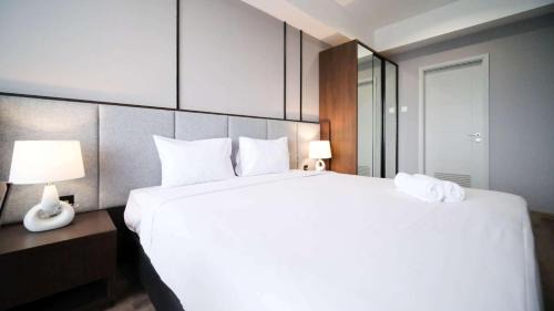 Tidy and Spacious 2BR at Grand Sungkono Lagoon Apartment By Travelio