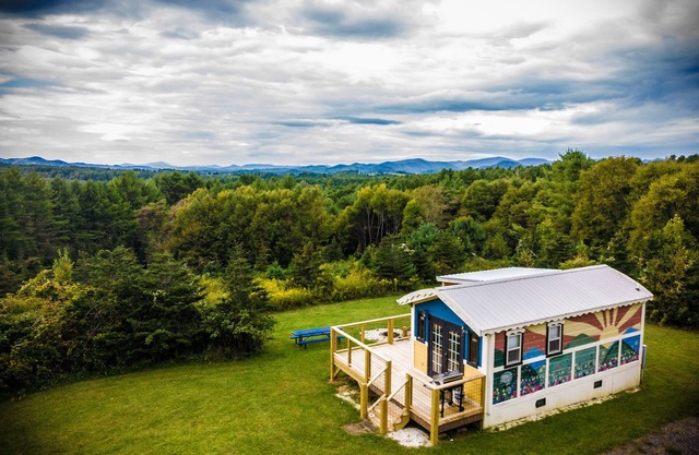 Tiny, charming mountaintop cottage with large firepit, deck and amazing views