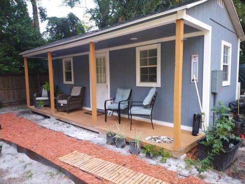 Tiny home barn style in backyard with Animals