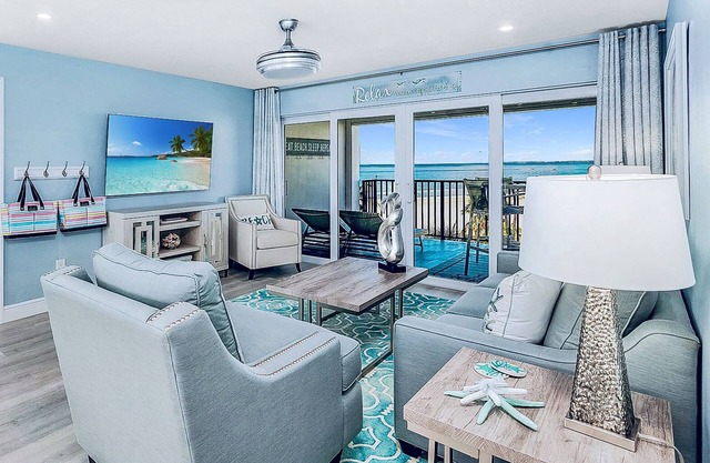 Top Floor Beachfront & Sunset Views! Renovated! WIFI, Smart TV's + Work Space!
