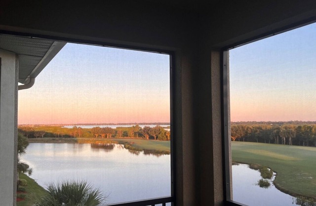 TOP FLOOR CORNER CONDO