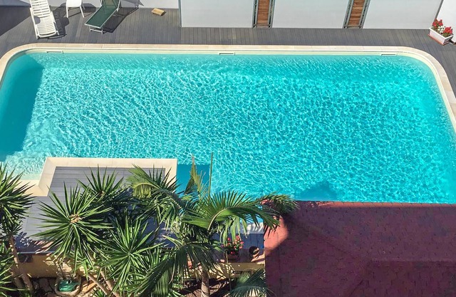 Totally renovated apartment with fantastic views over the city and sea.