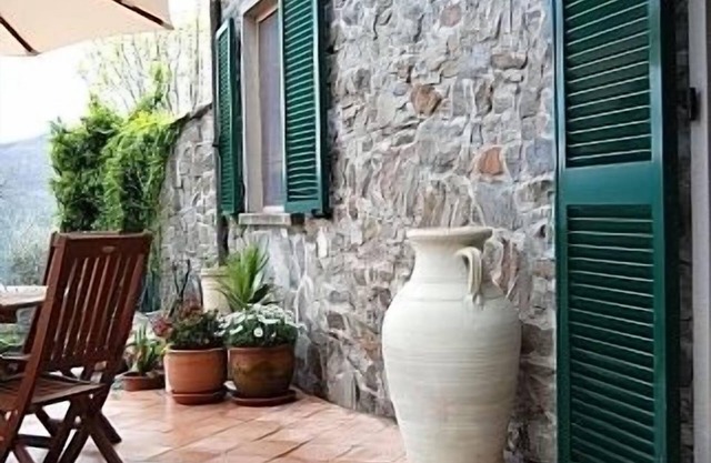 Traditional stone villa with terrace & gardens, in the hills of Lunigiana, Northern Tuscany.