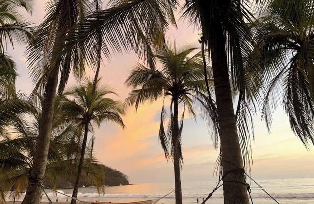 Tranquil retreat on coastal route. By sand, surf, river, & jungle. Perfect vibe.