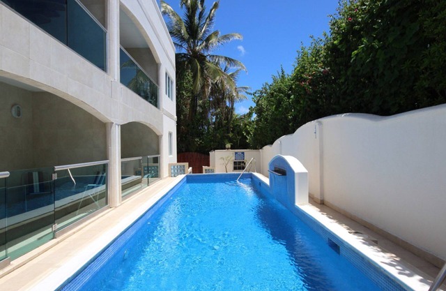 Tranquil 3 bedroom garden-view unit with direct access to the pool