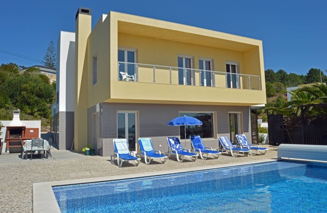 Tranquil family villa with lovely sea view, easy stroll to centre and beach.