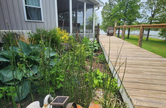 Tranquil setting! Desired location on Ky Lake with dock. Minutes to town.