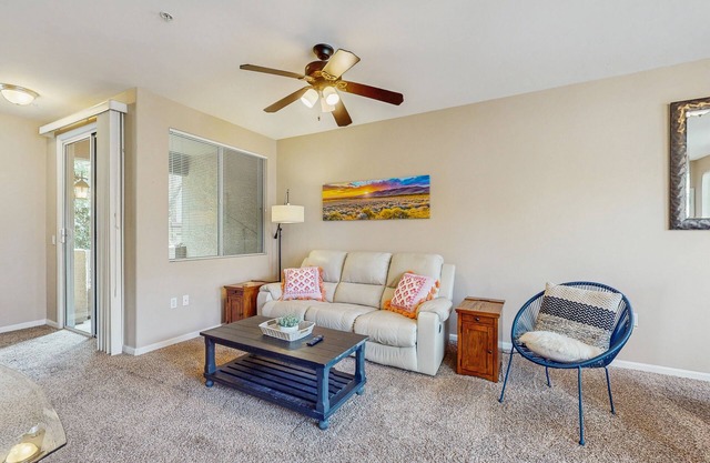 Tri-level Condo in Gated Community w/balcony, office, & shared pool/hot tub