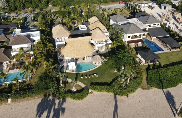 Tropical Golf View Villa. Steps to the ocean with a Gym and Theater-game room.