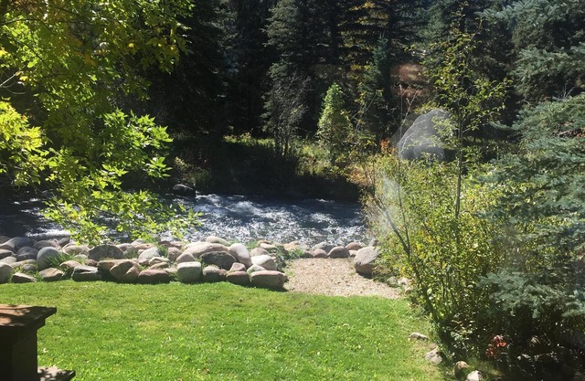 True Colorado Log home backing to the river