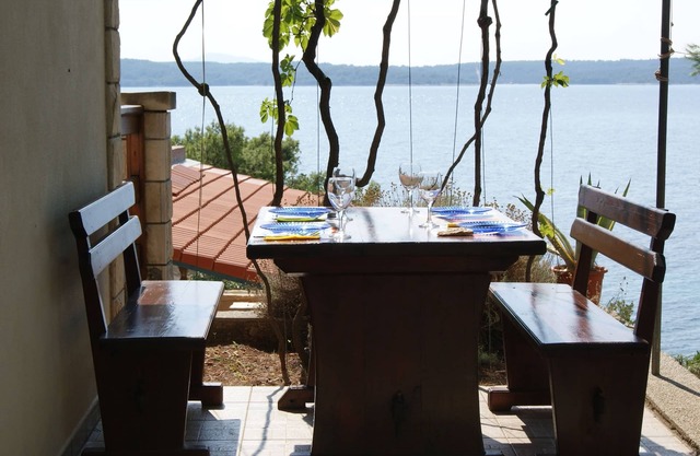Two bedroom apartment with terrace and sea view Zavala, Hvar (A-15357-a)