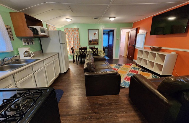 Two Bedroom Cabin - Street & Pool View - Two bedroom cabin conveniently located at Outrigger Resort, right down the road from Indiana Beach Amusement Park! This 600 sq ft classic cabin offers two (2) queen beds and two (2) futons to sleep six (6)! Am
