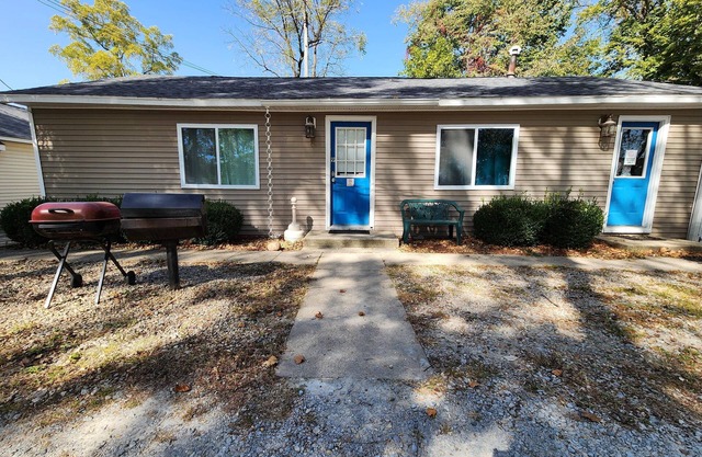 Two Bedroom Cabin - "The Big One" - This spacious cabin gets it's name honestly! Cabin is 800 sq ft with two-bedrooms feature three (3) queen beds, one (1) full size bed, and two (2) futons allow for a max of twelve (12) people. Conveniently located