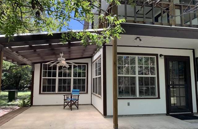 Two story home with Las Moras Creek views