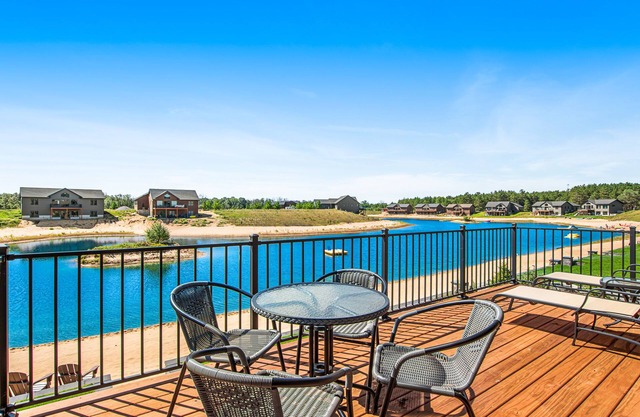 Two-story waterfront retreat with kayaks, central AC, deck, & washer/dryer