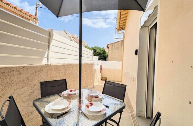 Typical house 20 m from the beach and the port