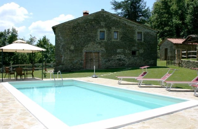 Typical stone farmhouse with private pool and garden situated in a hilly position a few km from the