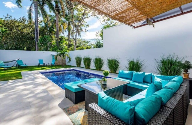 Ultramodern Townhome with an Inviting Coastal Design and Lush Outdoor Oasis with