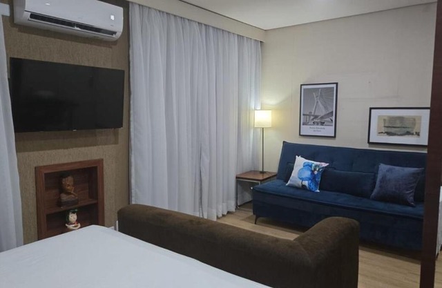 Unique Home 15min Cons USA - Smart TV e Sofá Cama