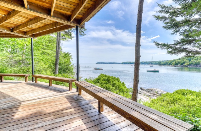 Unique oceanfront home with a deck, tons of natural light, & amazing views