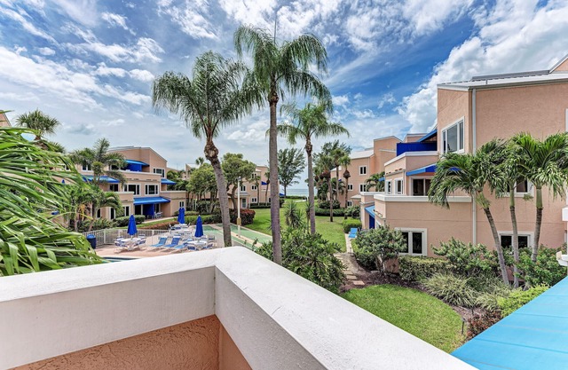 Unit #210 Sand Cay Beach Resort Pool and Garden View