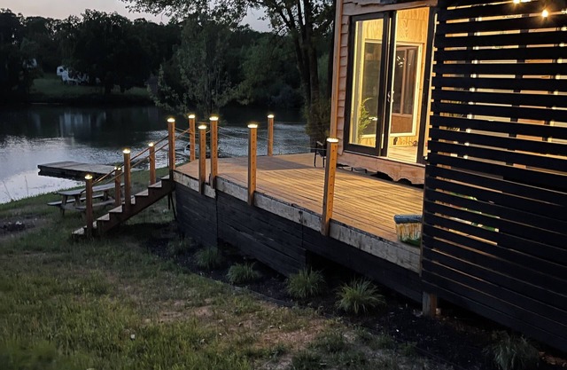 Unplug and unwind in this charming loft cabin nestled on the water’s edge.