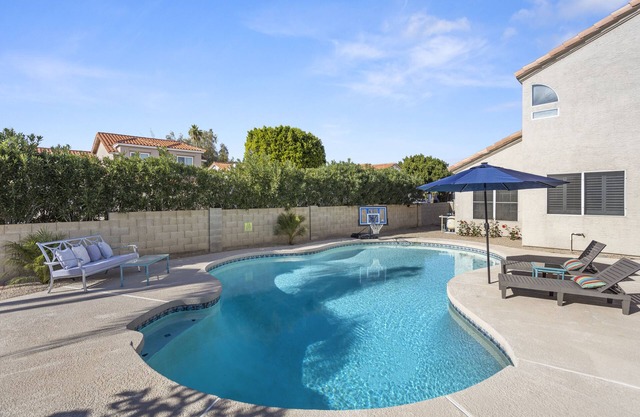 Updated backyard oasis w/unheated pool, hot tub and Patio misters for summer!