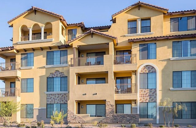 UpScale Resort with Outdoor Heated Pool with a waterslide and a poolside bar, tennis court and gym