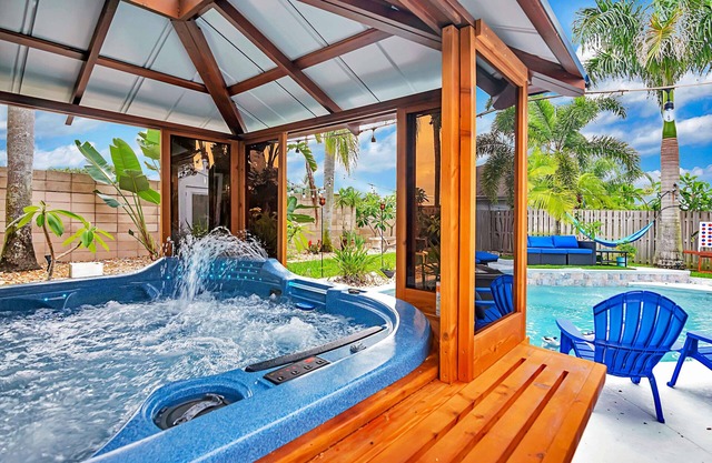 Urban Oasis W/hot Tub, Heated Pool And Private Movie Theater 2 Bedroom Home by RedAwning