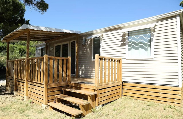 Ushuaïa Villages Camping Figurotta * - Prestige mobile home 40m² - 3 bedrooms + air conditioning + TV + Covered Terrace 8 people