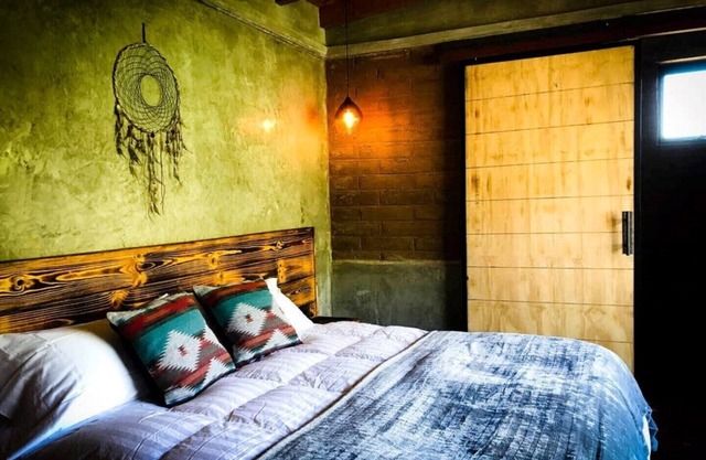UvaUva 1| eco-retreat |King size bed-balcony